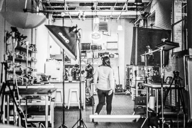 Woman walking through a film set